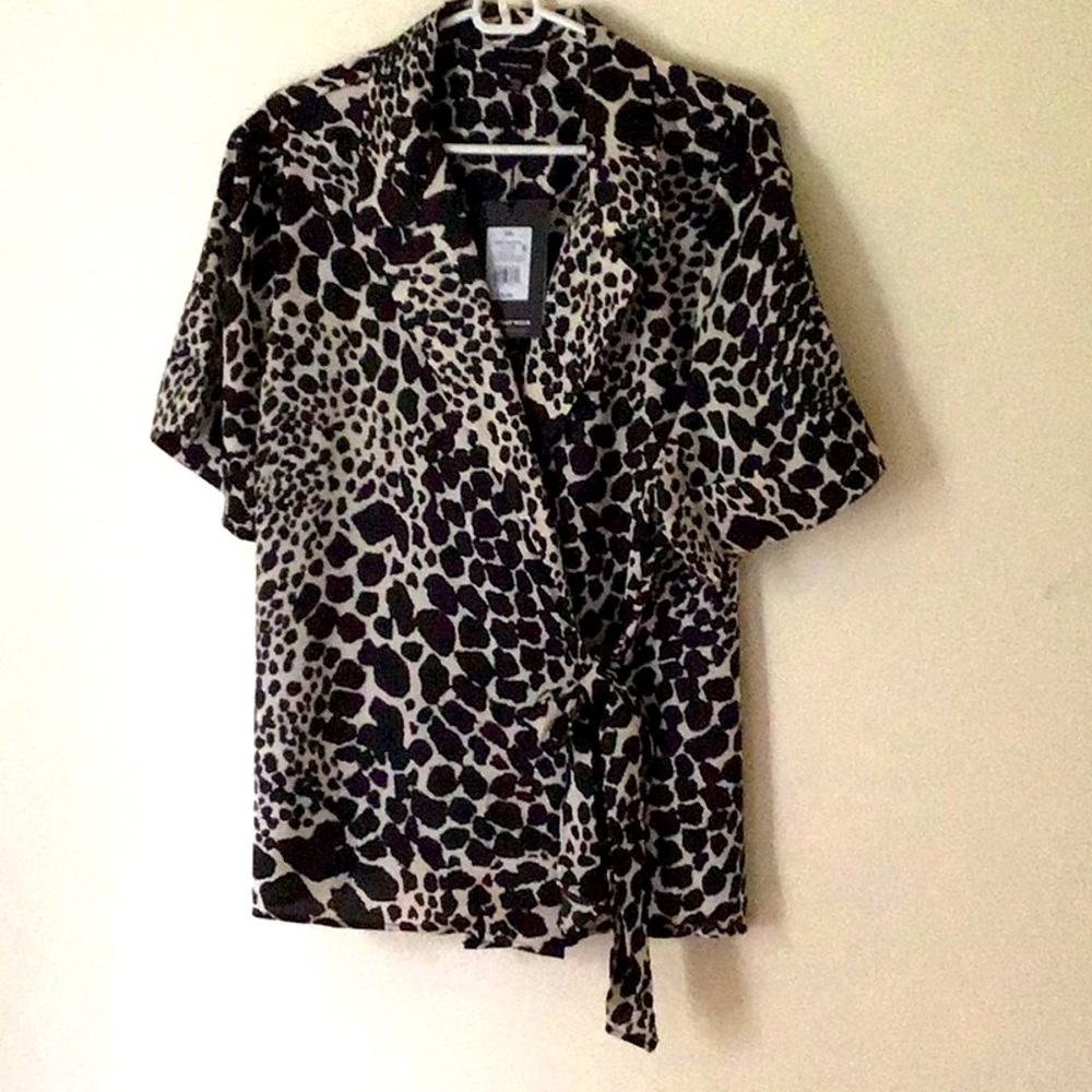 Wrap blouse with side tie and cuffed sleeves